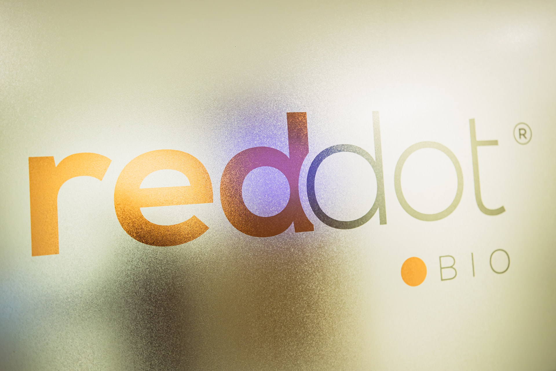 Reddot Bio signage on frosted glass